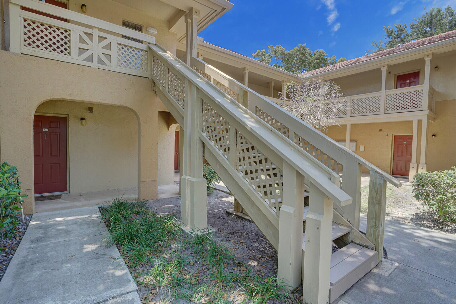 4855 Via Palm Lakes, Unit 902 West Palm Beach, FL 33417 - Photo 22 of 24 a view of front door of house