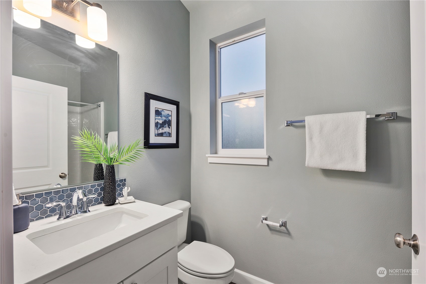 10980 Southeast 165th Street Renton, WA 98055 - Photo 16 of 16 a bathroom with a sink toilet and mirror