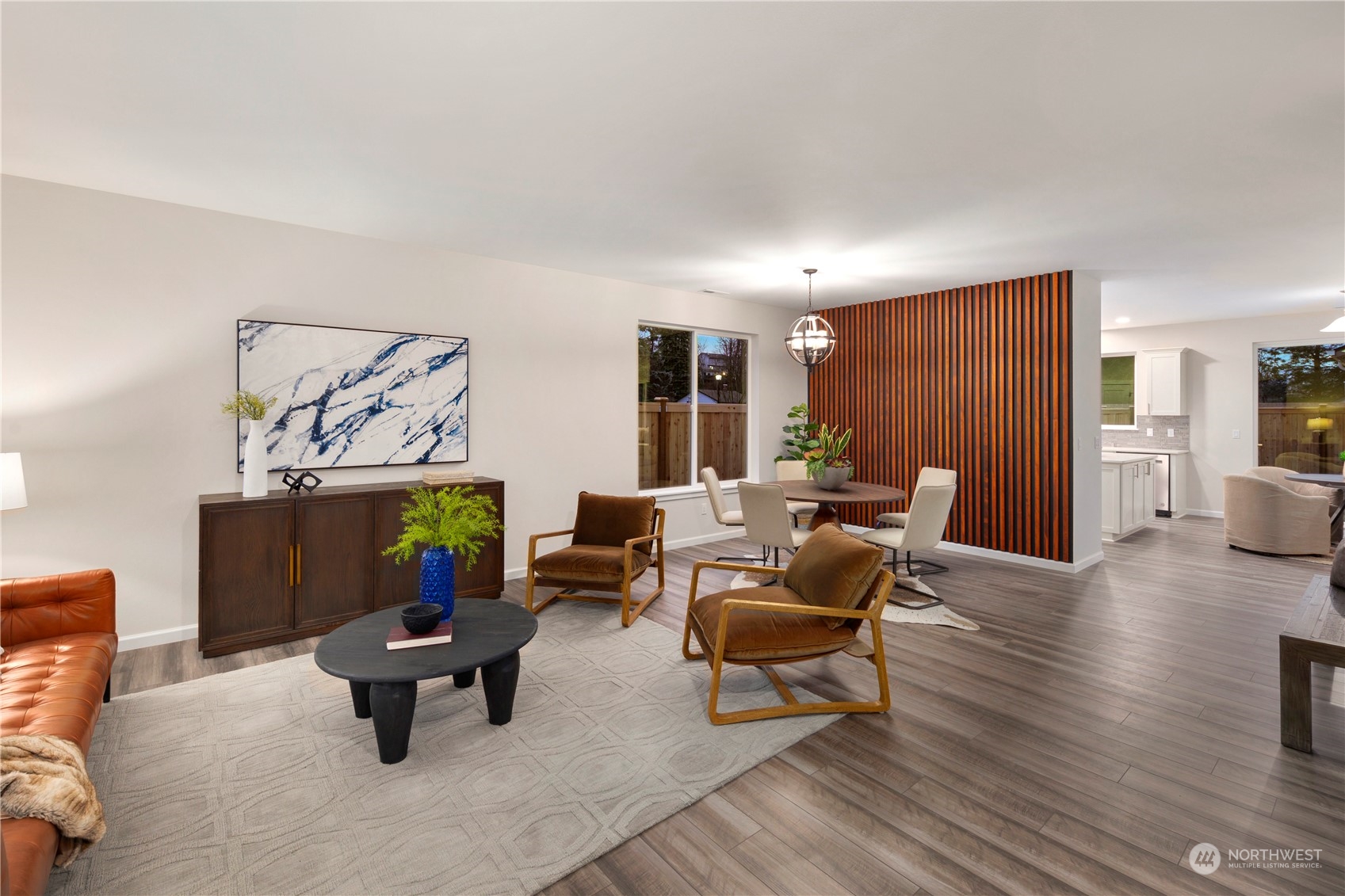 10980 Southeast 165th Street Renton, WA 98055 - Photo 5 of 16 a living room with furniture and a wooden floor