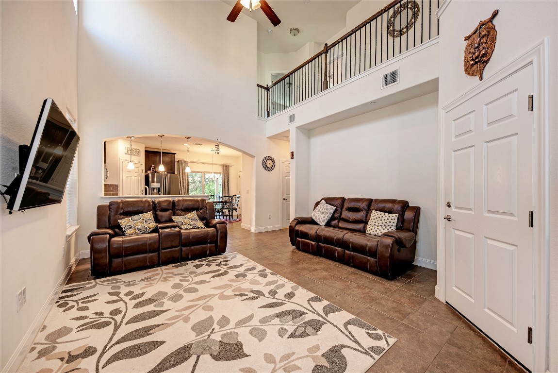 a living room with furniture and a rug