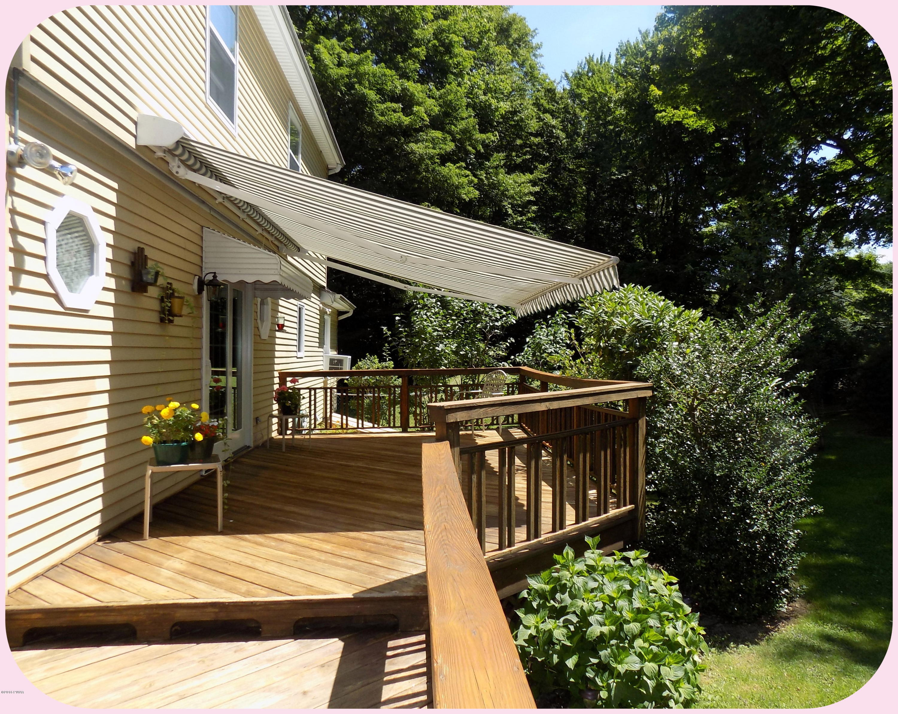 125 Timber Ridge Drive Newfoundland, PA 18445 - Photo 58 of 80 Relax in the shade w/ retractable awning