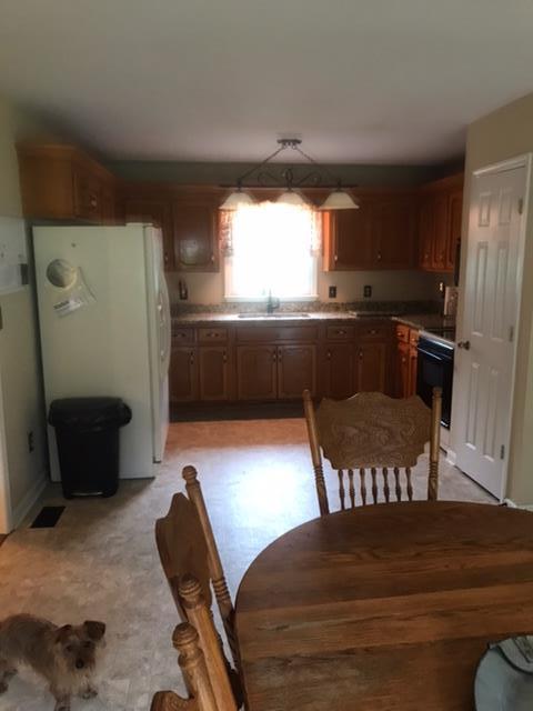 5070 Joe Peay Road Spring Hill, TN 37174 - Photo 14 of 25 a living room with furniture and a window