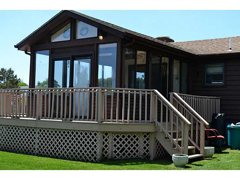 27 Bristol Road Narragansett, RI 02882 - Photo 3 of 10 Exterior Back. Huge sun room. Plenty of room for friends. Great place to relax after a perfect day at the beach.
