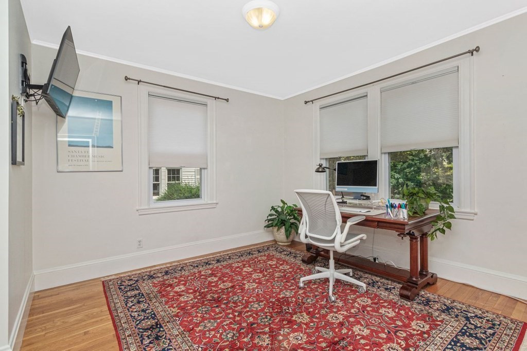 50 Crosby Road, Unit 1 Chestnut Hill, MA 02467 - Photo 18 of 27 a workspace with furniture and a window
