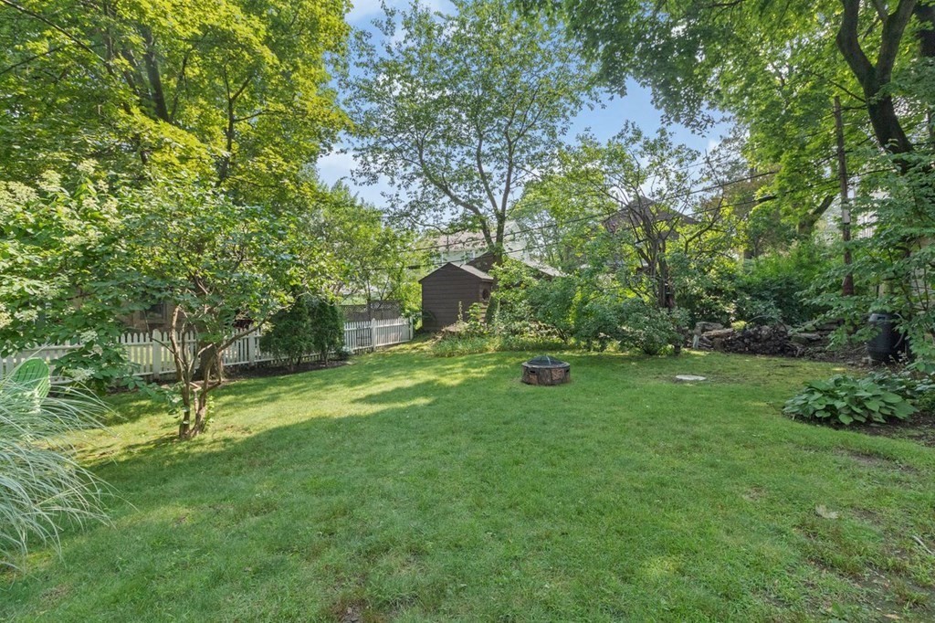 50 Crosby Road, Unit 1 Chestnut Hill, MA 02467 - Photo 23 of 27 a view of a backyard with a garden