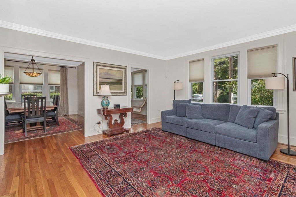 50 Crosby Road, Unit 1 Chestnut Hill, MA 02467 - Photo 3 of 27 a living room with furniture and a wooden floor