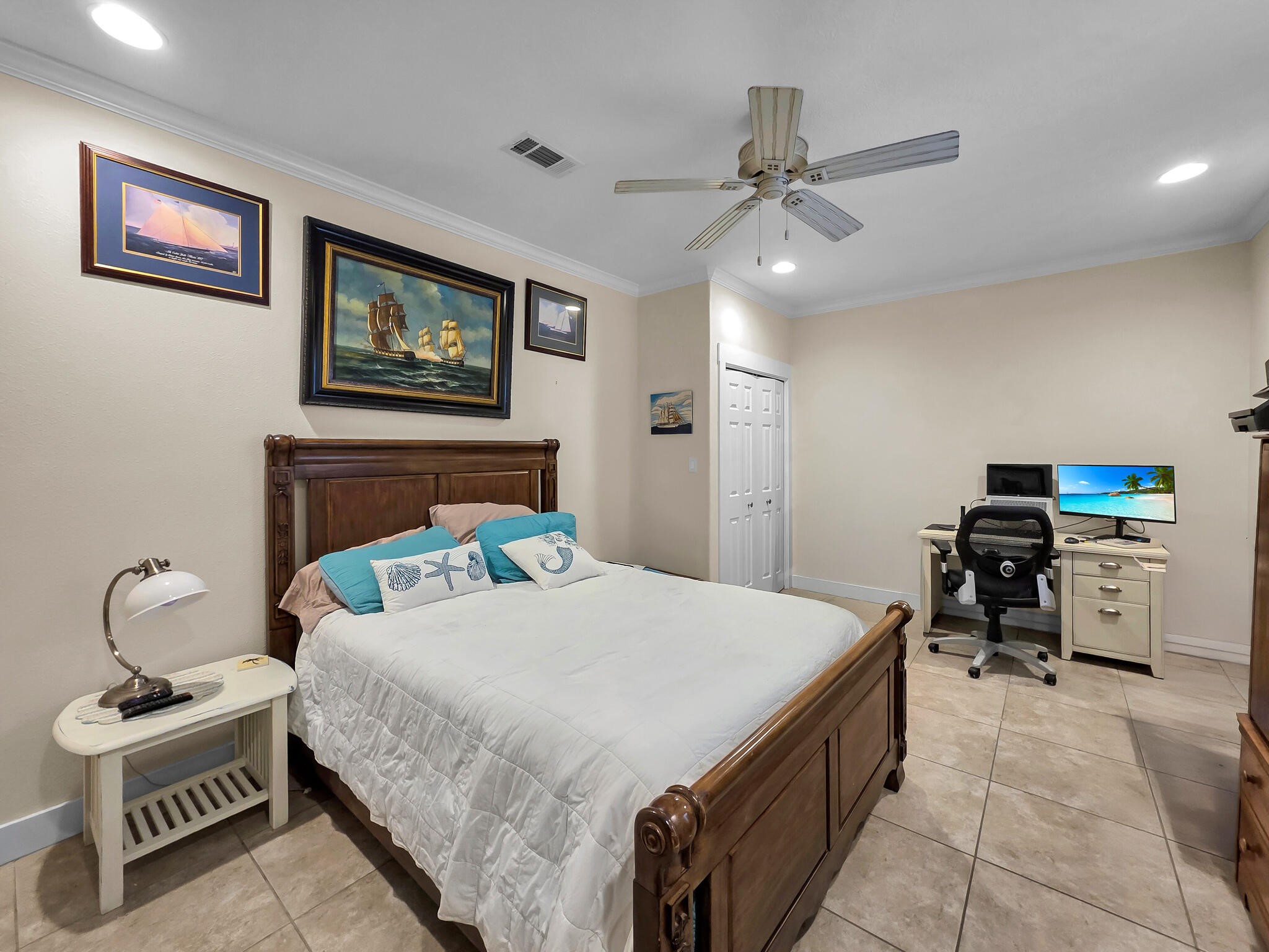 2383 Sandpiper Crystal Beach, TX 77650 - Photo 12 of 48 a bedroom with a bed and furniture