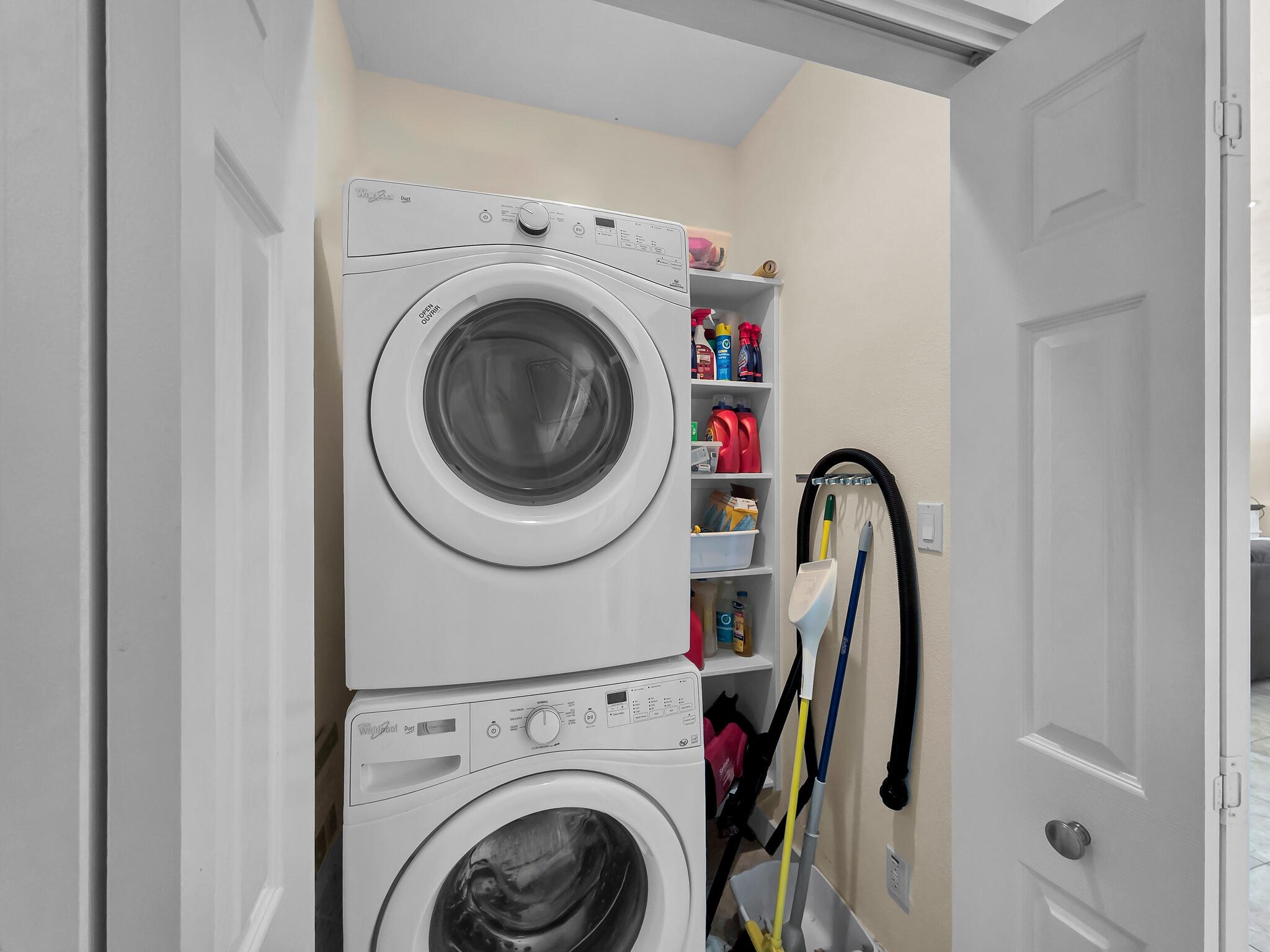 2383 Sandpiper Crystal Beach, TX 77650 - Photo 24 of 48 a utility room with dryer and washer