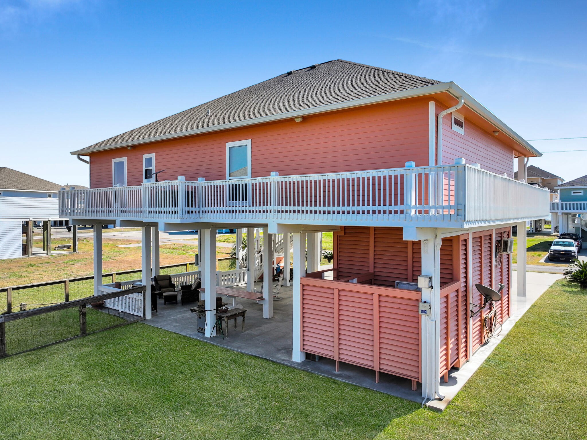 2383 Sandpiper Crystal Beach, TX 77650 - Photo 35 of 48 a front view of a house with a yard