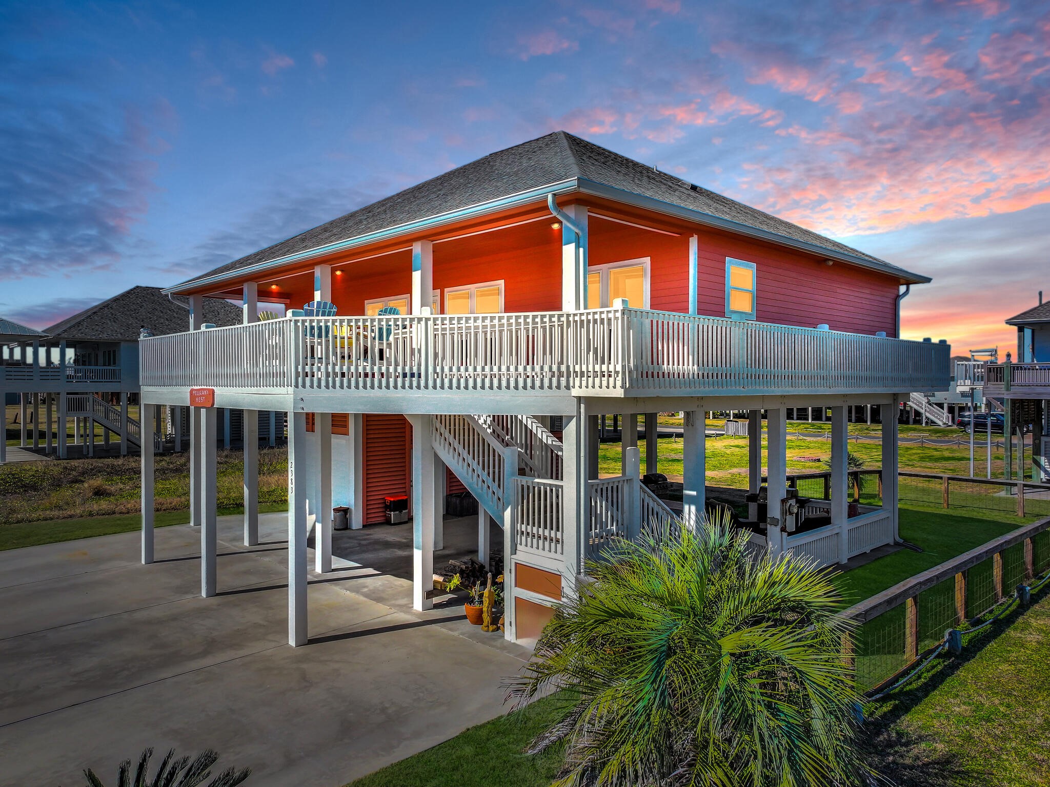 2383 Sandpiper Crystal Beach, TX 77650 - Photo 41 of 48 a front view of building with deck and outdoor seating