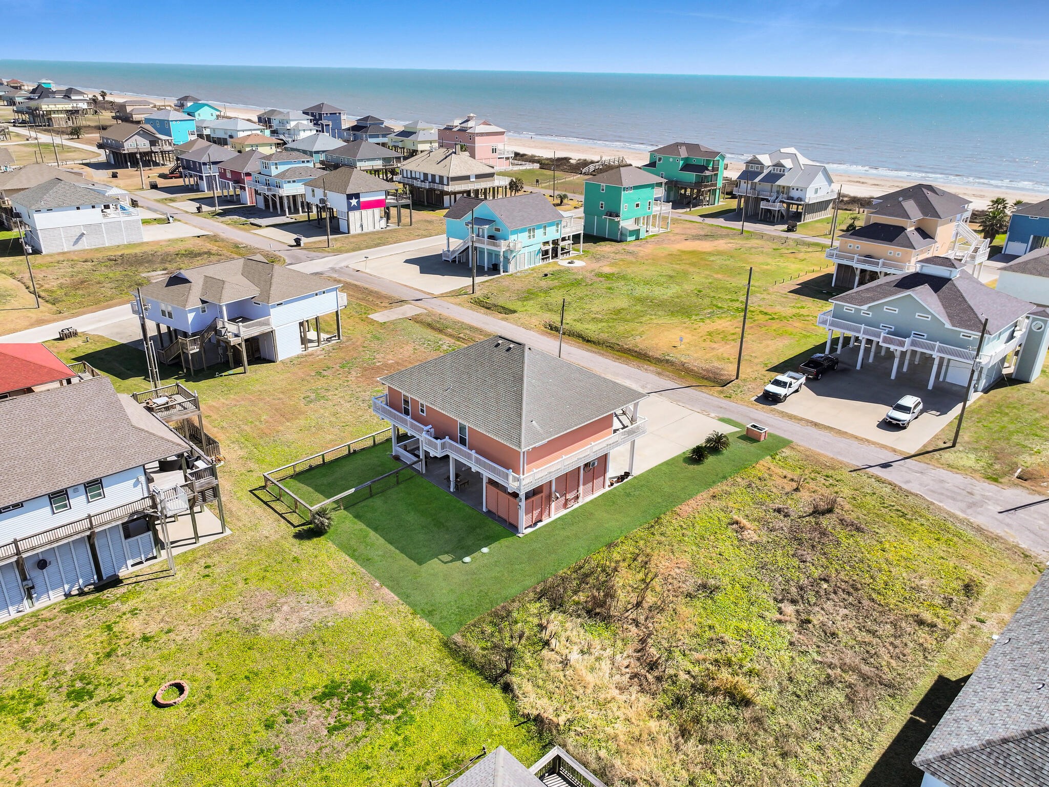 2383 Sandpiper Crystal Beach, TX 77650 - Photo 43 of 48 an aerial view of a house with a swimming pool