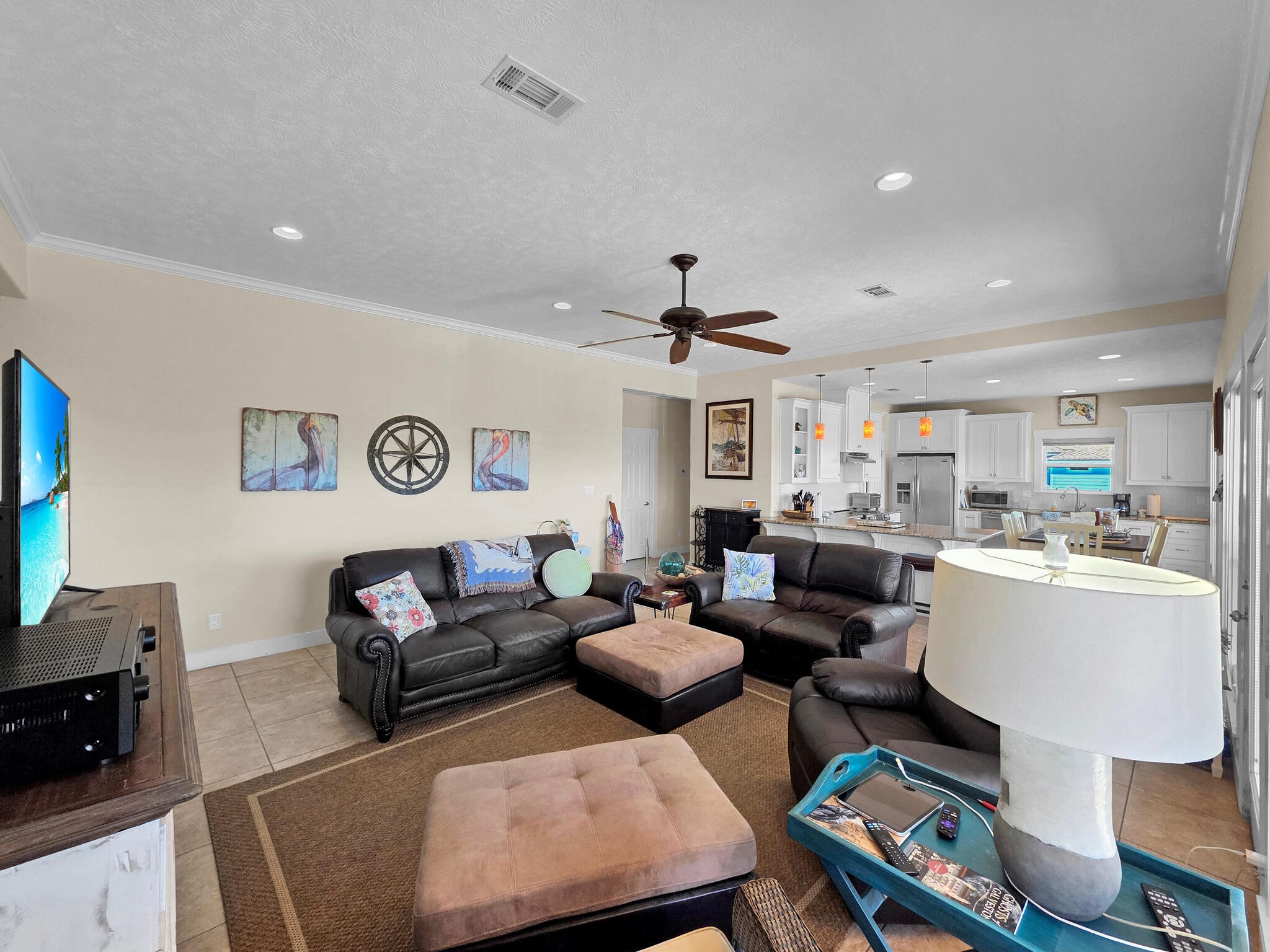 2383 Sandpiper Crystal Beach, TX 77650 - Photo 5 of 48 a living room with furniture and a flat screen tv