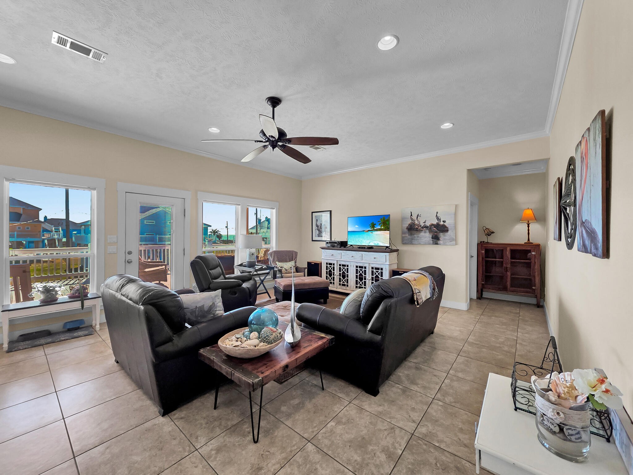 2383 Sandpiper Crystal Beach, TX 77650 - Photo 6 of 48 a living room with furniture and a large window