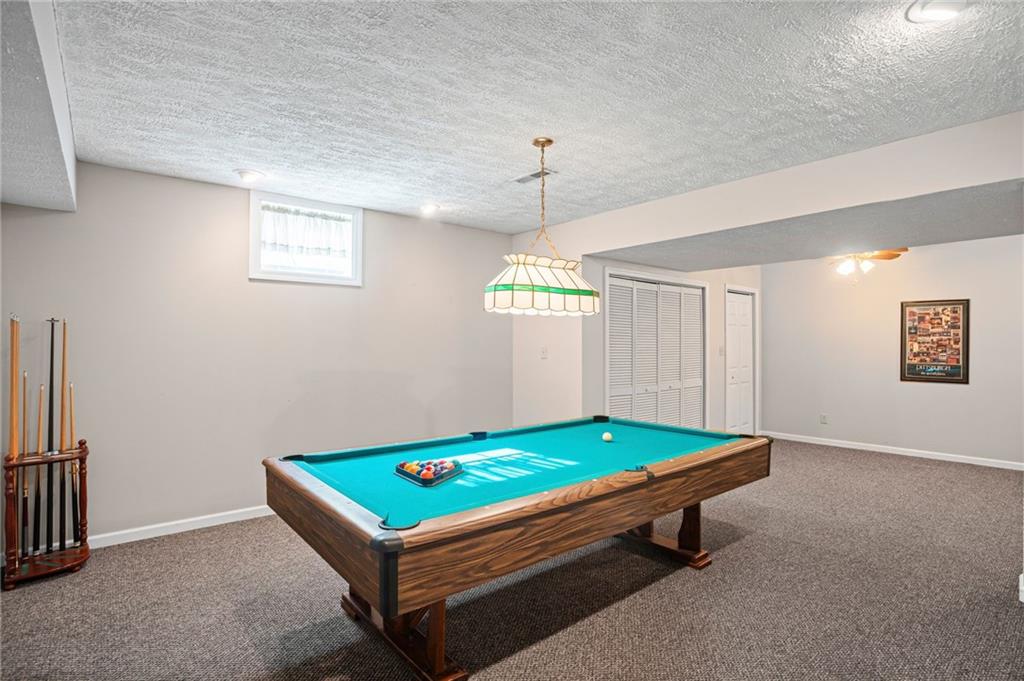 112 Field Club Circle McKees Rocks, PA 15136 - Photo 40 of 44 The finished basement served as a much loved game room over the years, providing hours of enjoyment.