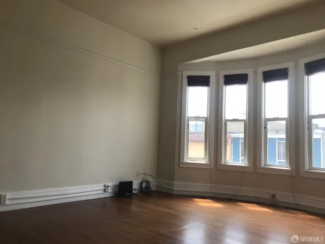 a kitchen with granite countertop a stove and a sink