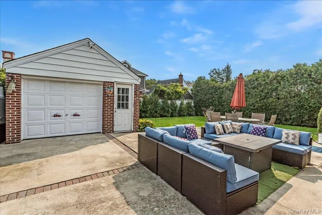 a view of a yard with furniture