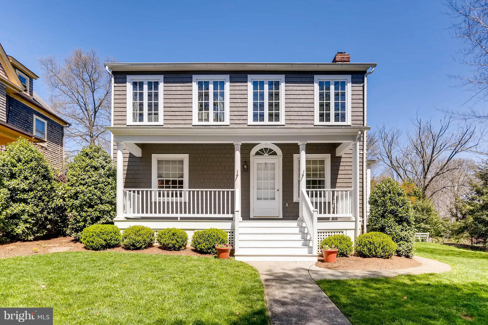 207 Oakdale Road Baltimore, MD 21210 - Photo 1 of 30 a front view of a house with a yard
