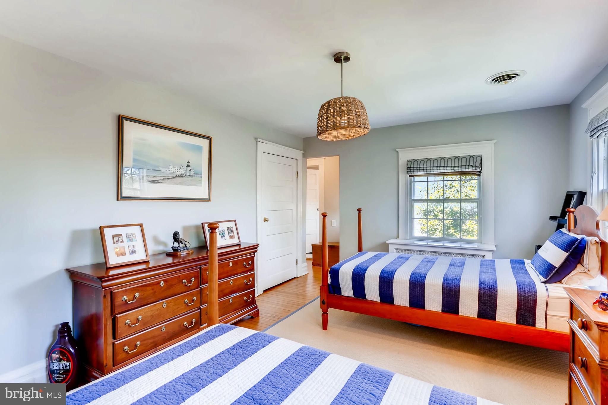 207 Oakdale Road Baltimore, MD 21210 - Photo 20 of 30 a bedroom with a bed and window