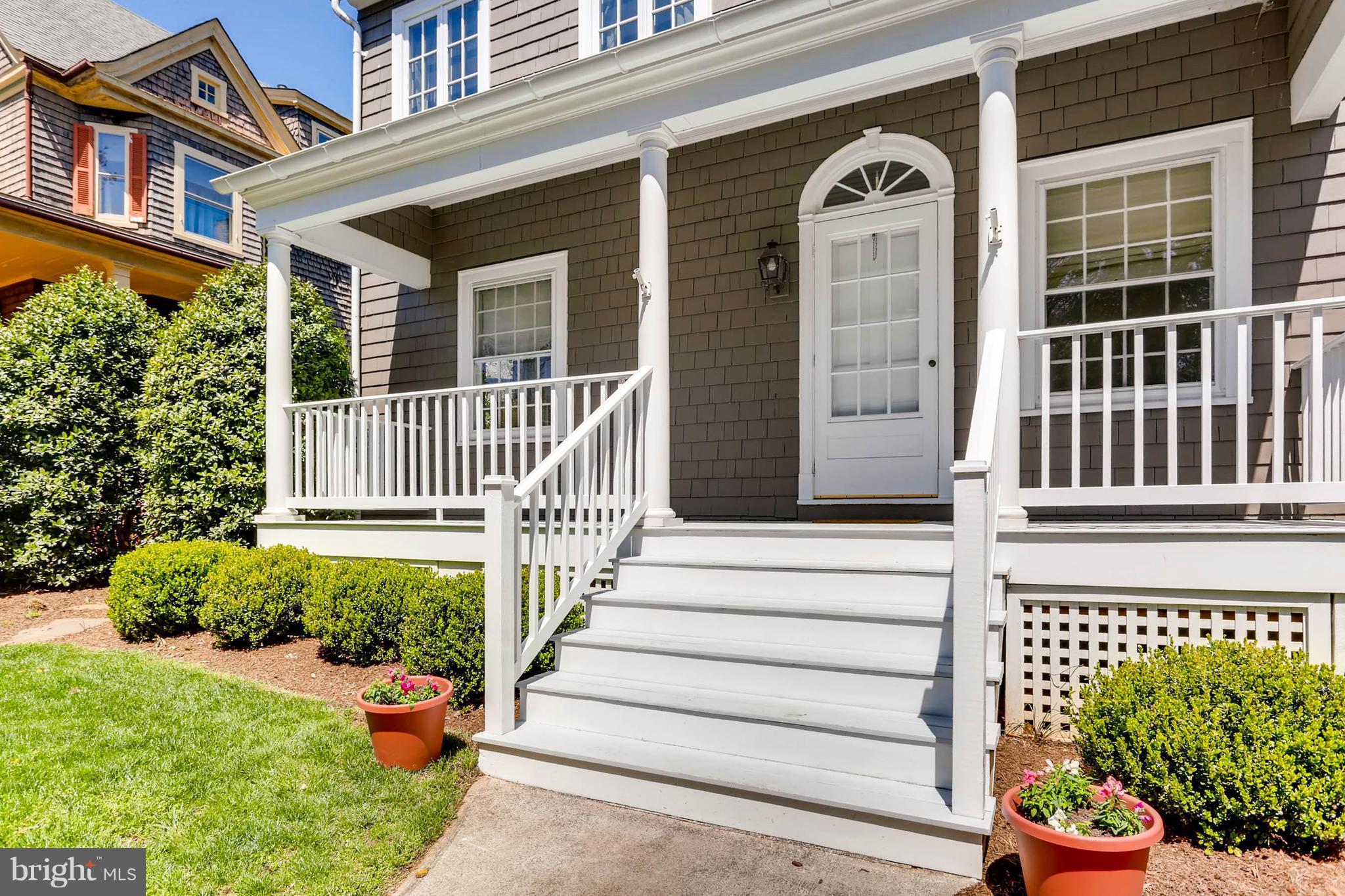 207 Oakdale Road Baltimore, MD 21210 - Photo 3 of 30 a front view of a house with a garden