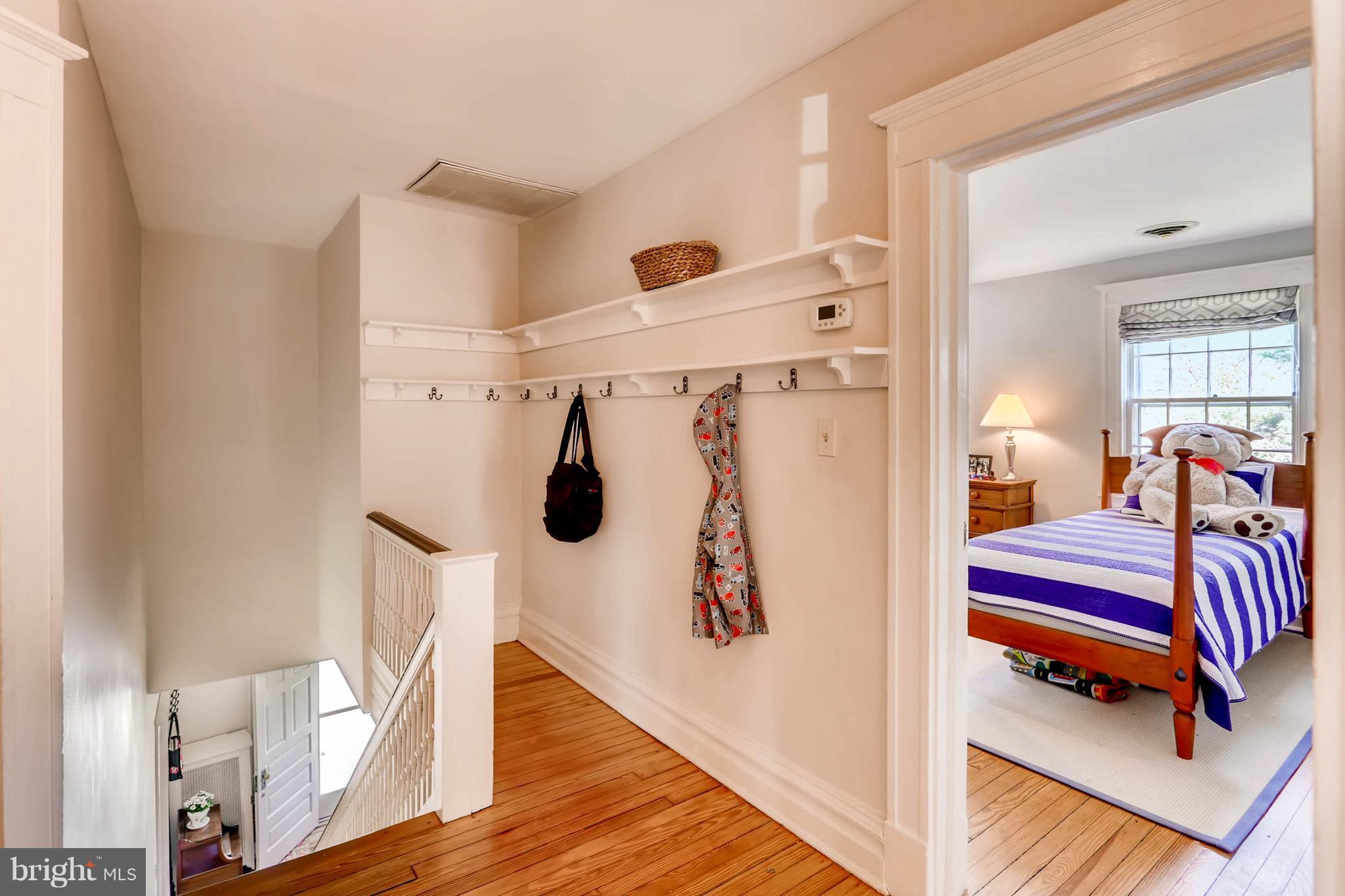 207 Oakdale Road Baltimore, MD 21210 - Photo 24 of 30 a room with gym equipment and wooden floor