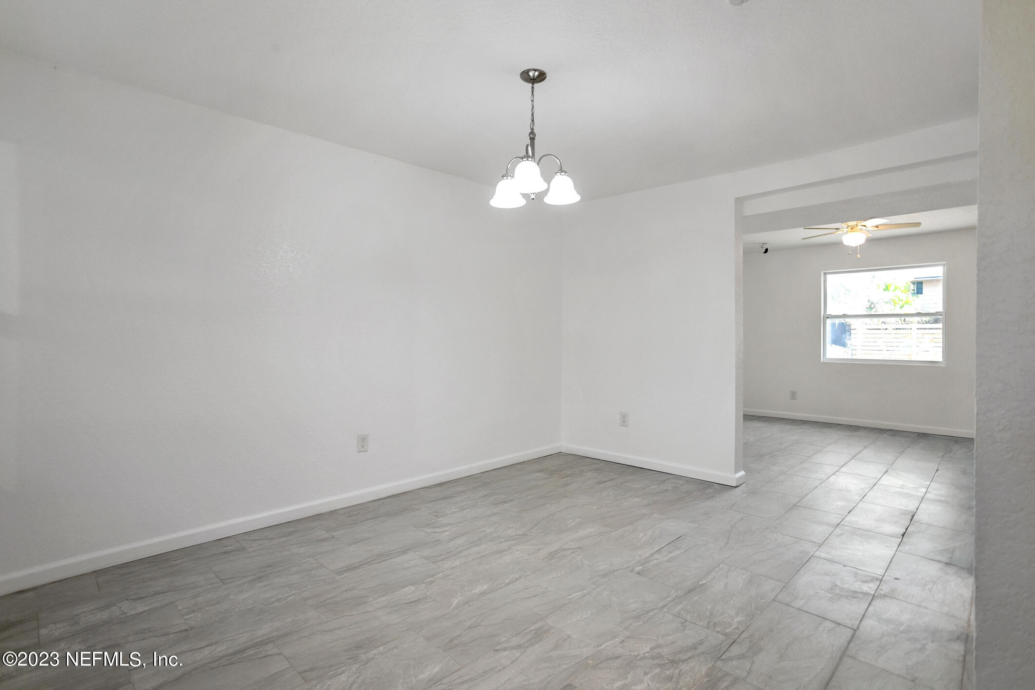 3616 Effee Street Jacksonville, FL 32209 - Photo 7 of 18 an empty room that has a window in it