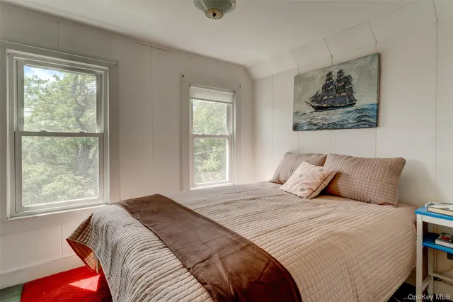a living room filled with furniture and a garden
