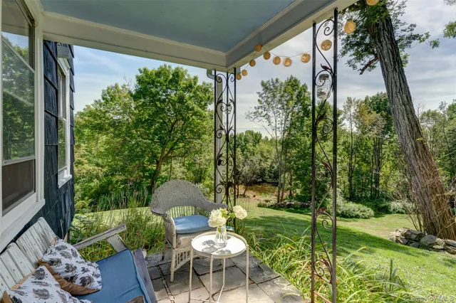 a view of a yard with trees