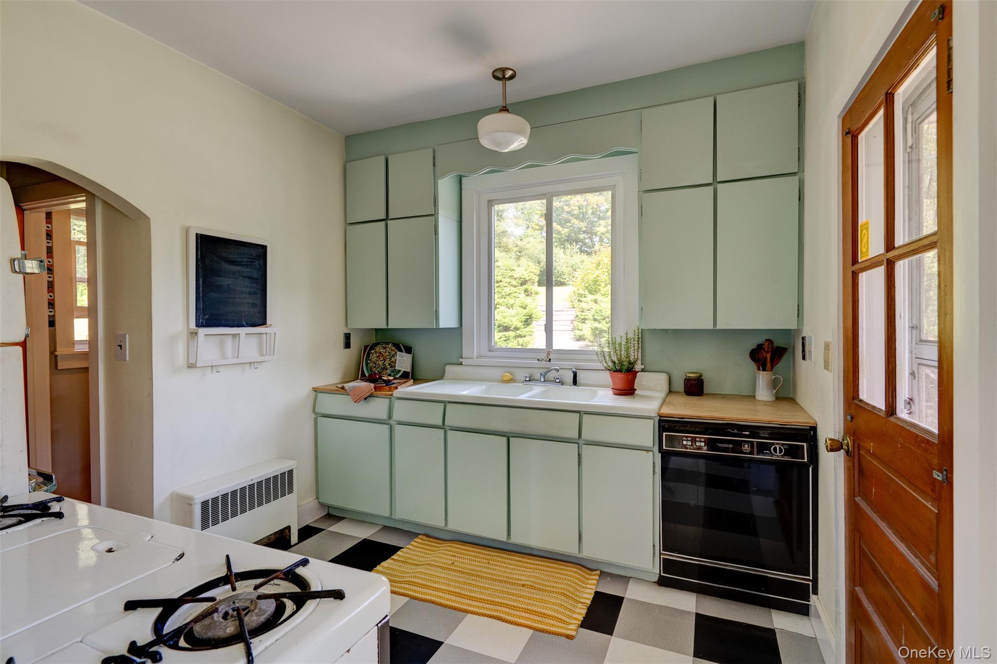 578 Bethlehem Road Callicoon Center, NY 12724 - Photo 7 of 39 a kitchen that has a sink and a stove in it