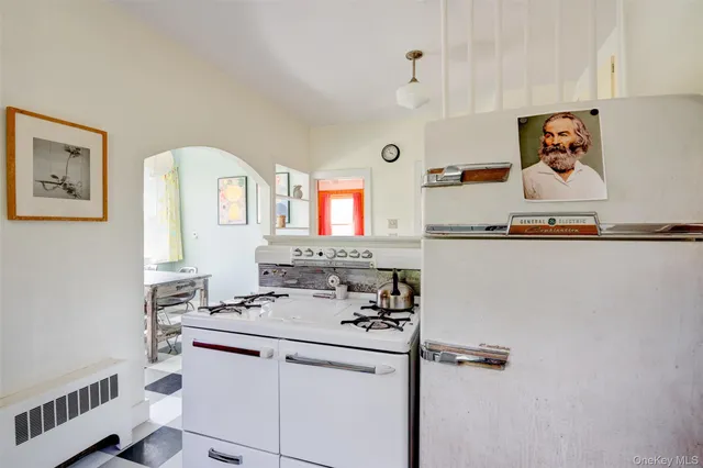 a bathroom with a sink mirror and vanity