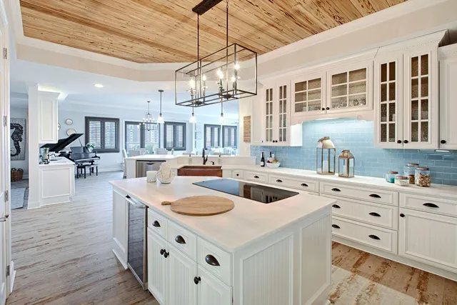 a kitchen that has a lot of cabinets in it