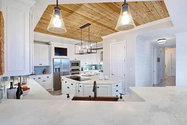 a living room with furniture and flat screen tv