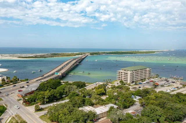 a view of a lake with a yard