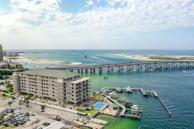 a view of a lake with tall buildings