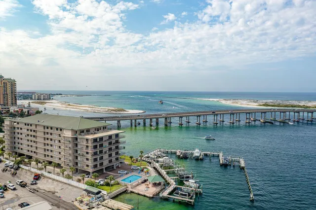 a view of a lake with tall buildings