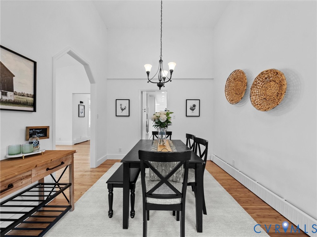 5117 Byrd Mill Road Louisa, VA 23093 - Photo 12 of 50 Dining area featuring arched walkways, a chandelie