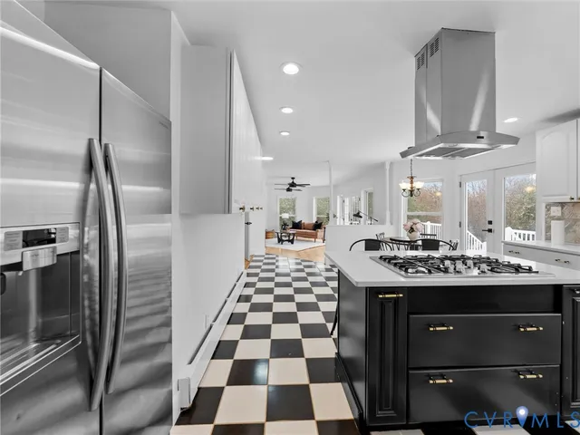 a living room with furniture a rug and a fireplace