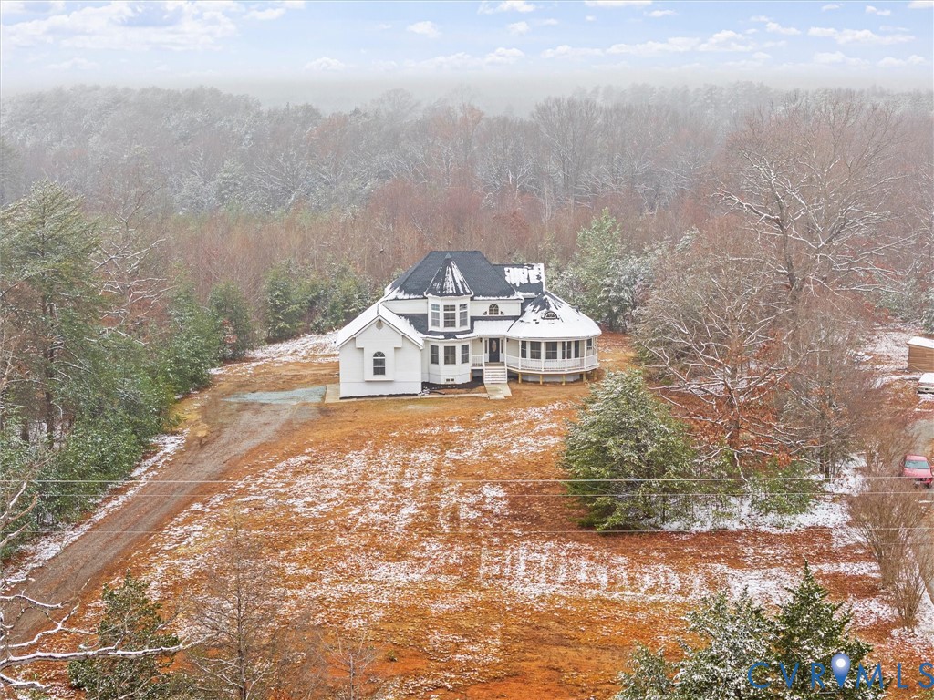 5117 Byrd Mill Road Louisa, VA 23093 - Photo 2 of 50 Snowy aerial view featuring a forest view
