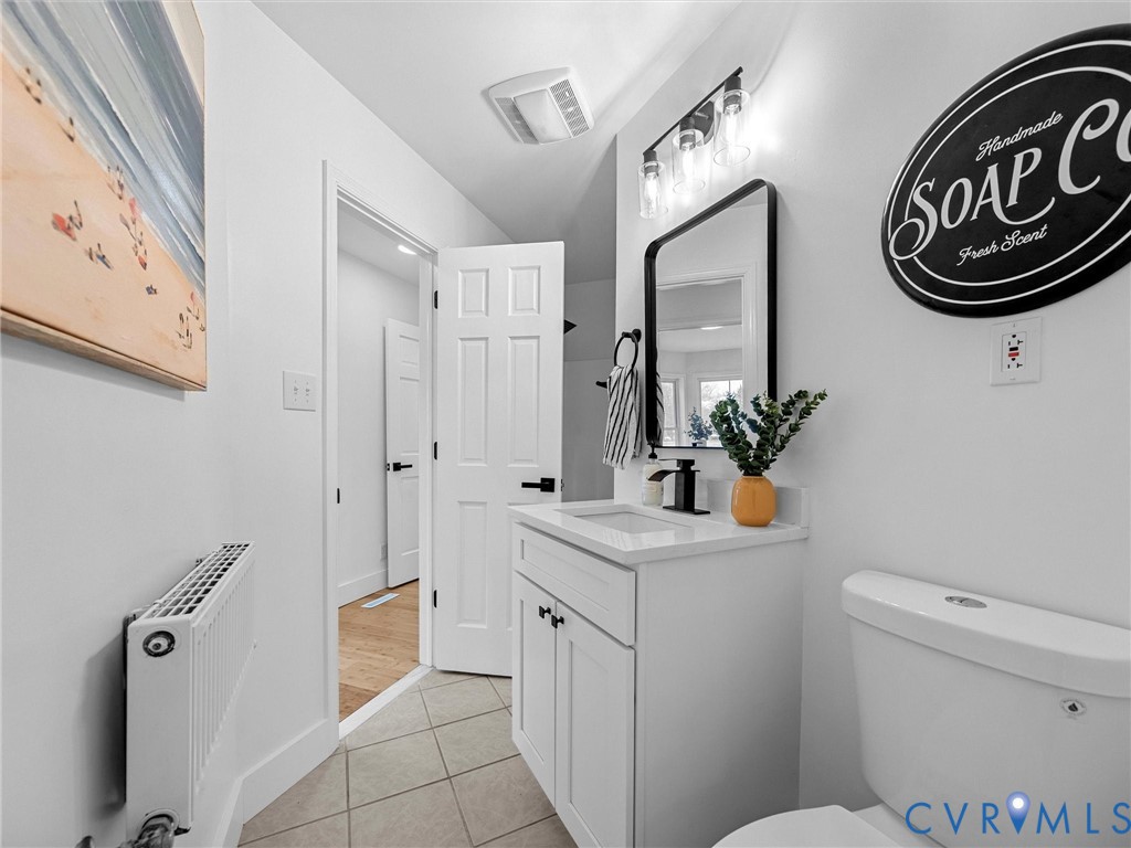 5117 Byrd Mill Road Louisa, VA 23093 - Photo 25 of 50 Bathroom with vanity, light tile patterned floorin