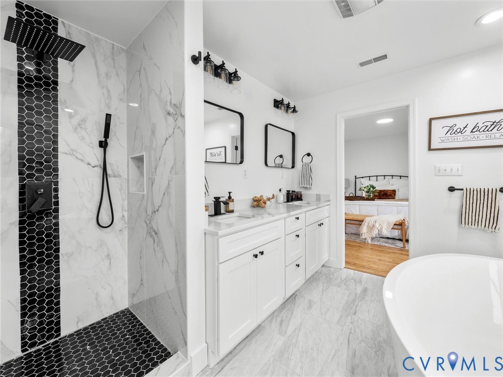 5117 Byrd Mill Road Louisa, VA 23093 - Photo 38 of 50 Bathroom with connected bathroom, light marble fin