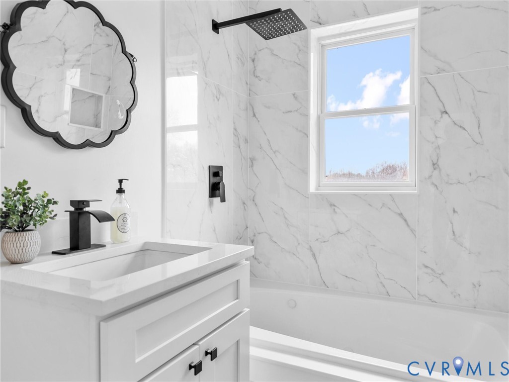 5117 Byrd Mill Road Louisa, VA 23093 - Photo 42 of 50 Full bathroom featuring vanity and a combined bath