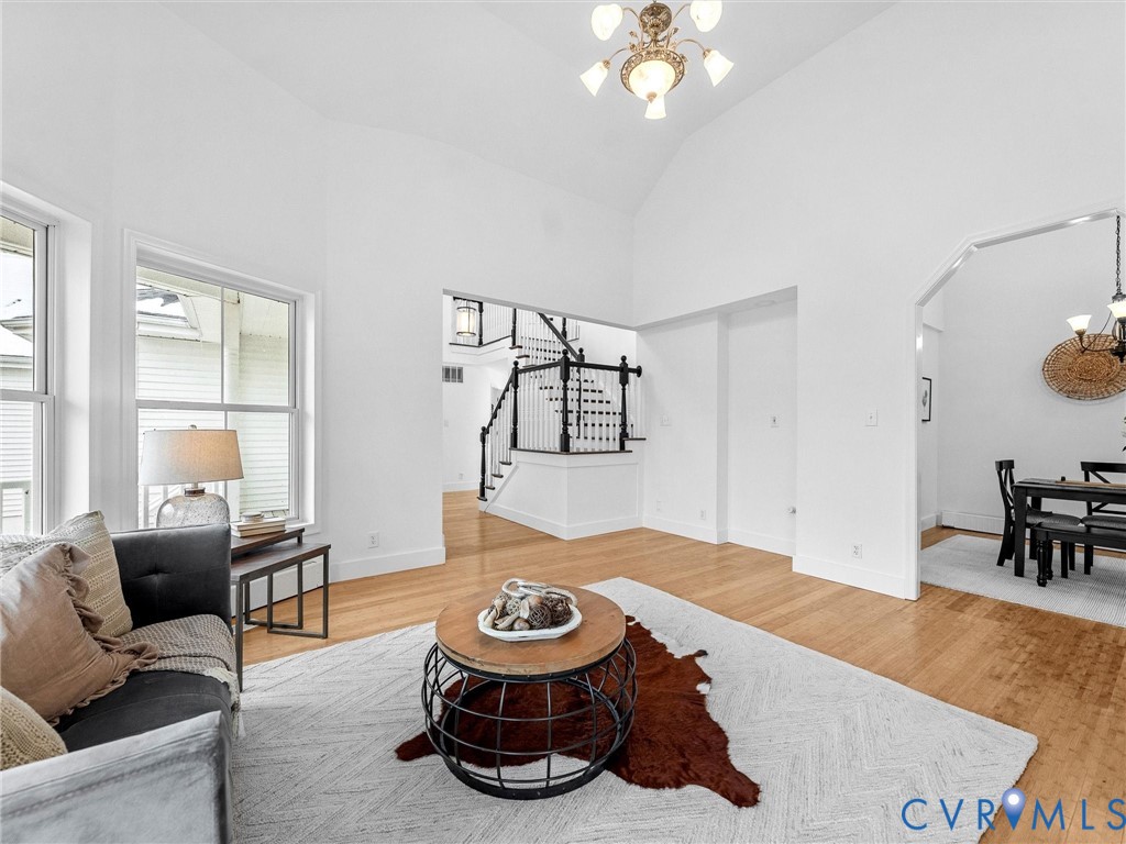 5117 Byrd Mill Road Louisa, VA 23093 - Photo 10 of 50 Living room featuring a chandelier, high vaulted c