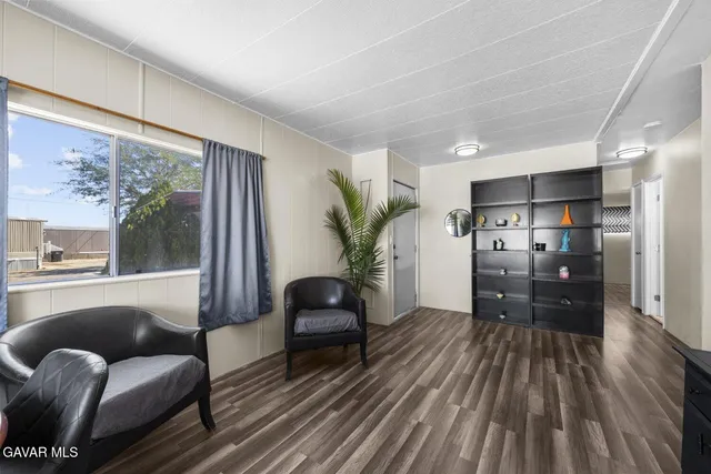 a kitchen with a sink and a refrigerator