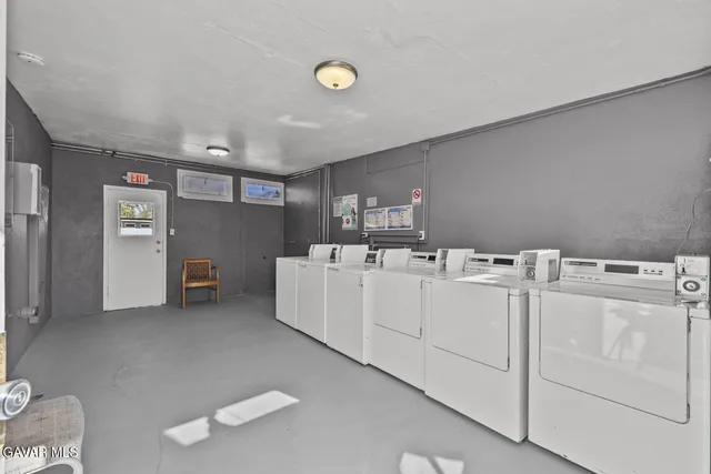 a living room with furniture and window