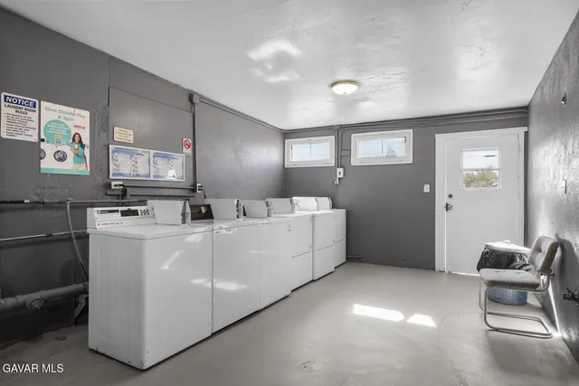 a view of a street with a building in the background