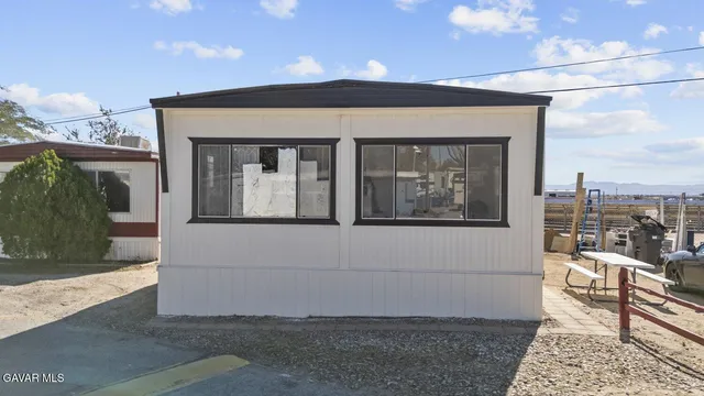 a view of a house with a porch