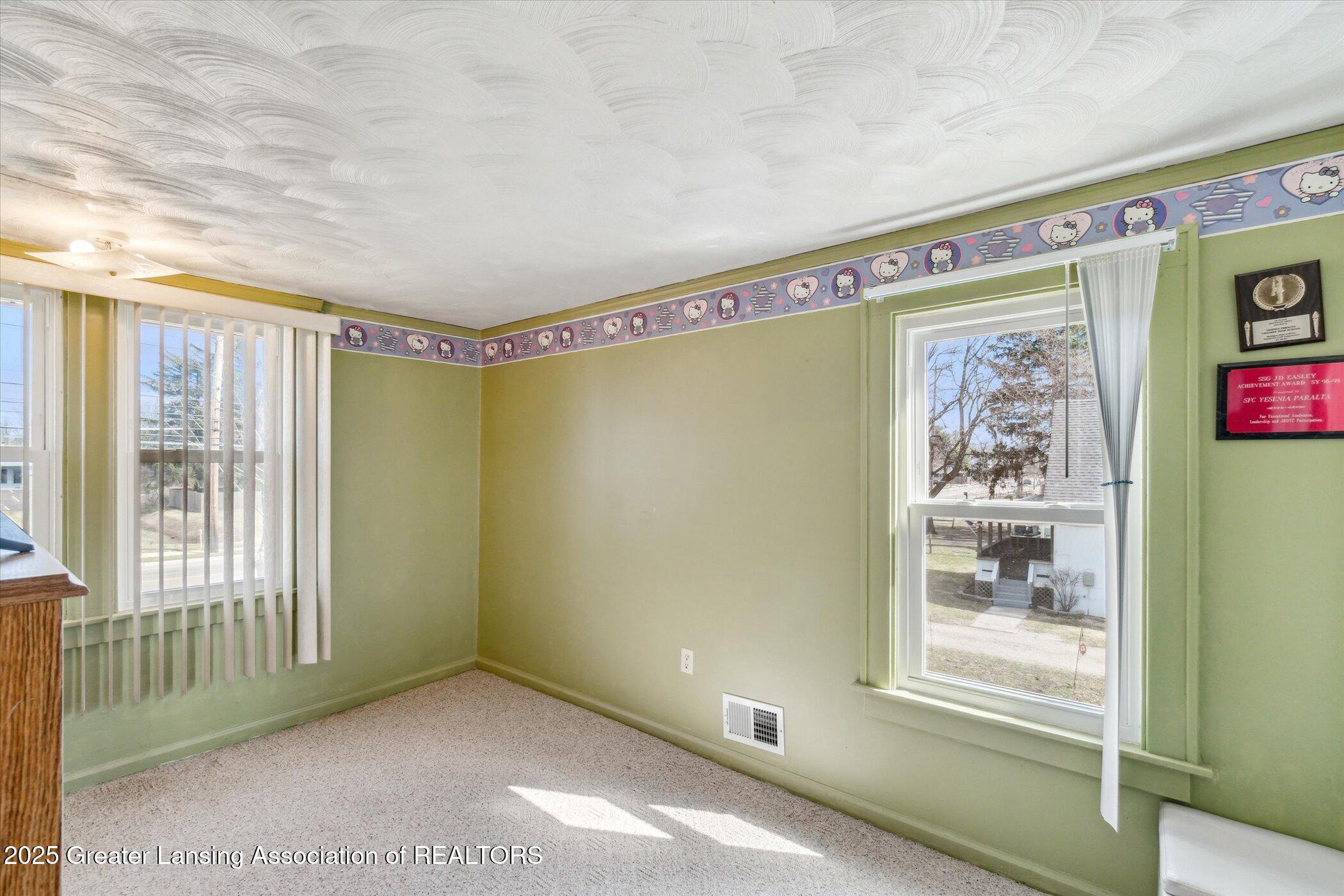 1717 West Jolly Road Lansing, MI 48910 - Photo 31 of 64 32-1717-W-Jolly-Rd-Lansing-MI-48910-Wind
