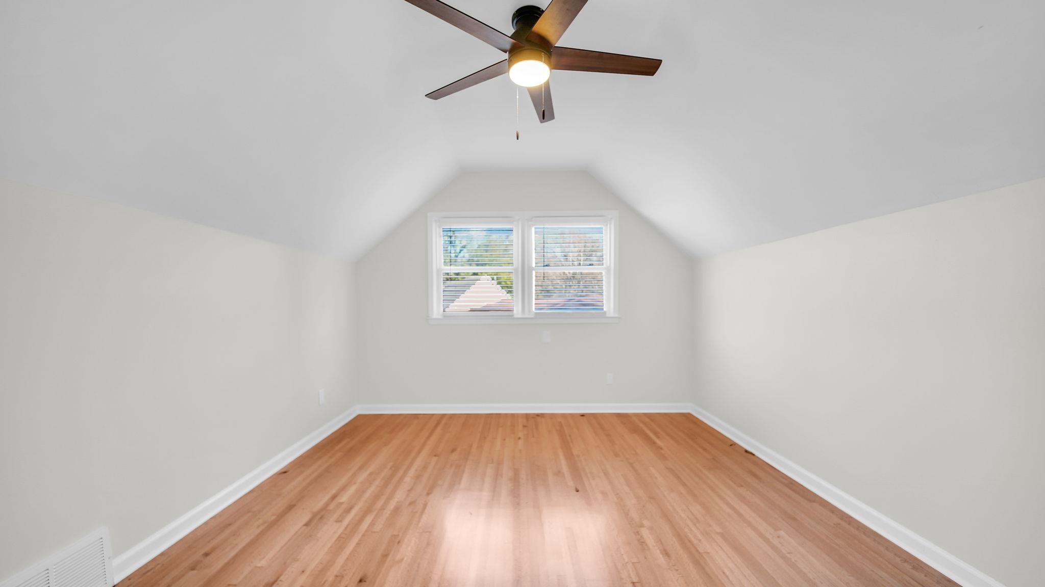 2800 Spring Hill Drive Memphis, TN 38127 - Photo 28 of 31 an empty room with a window and a ceiling fan
