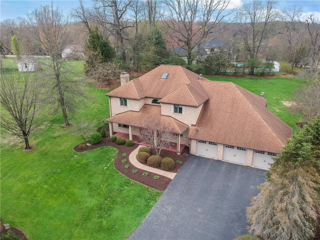 110 Larkspur Circle Butler, PA 16002 - Photo 2 of 50 This striking brick home is situated on a sizable lush homesite with mature foliage around for privacy.