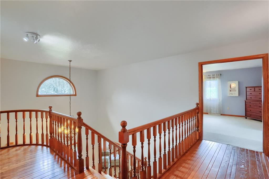110 Larkspur Circle Butler, PA 16002 - Photo 24 of 50 The second level features hardwood flooring and a overlook of the two story foyer.