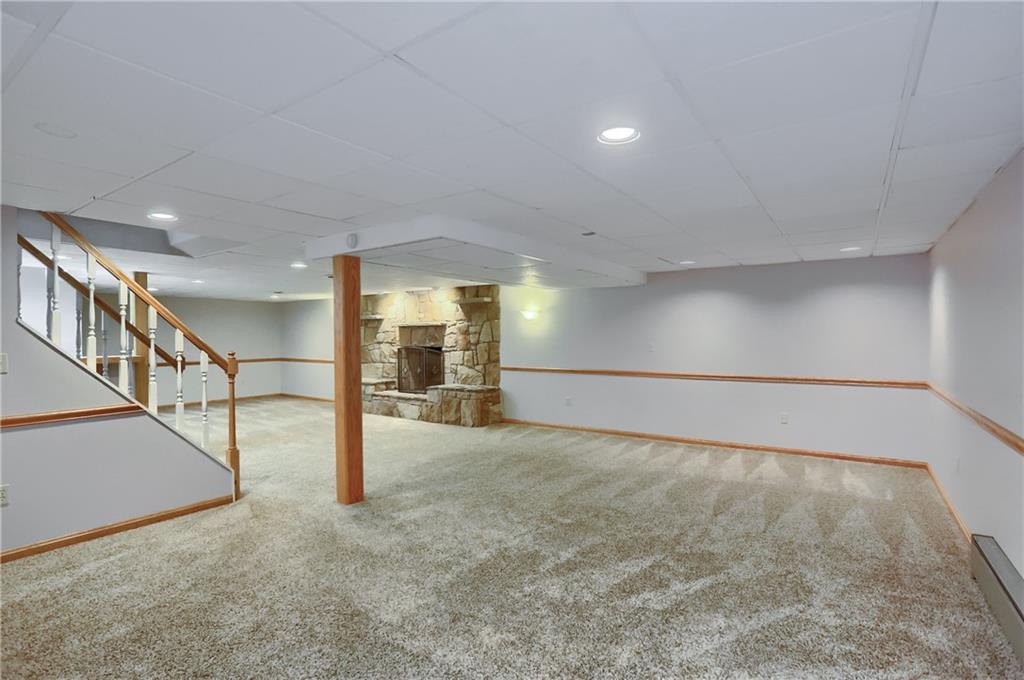 110 Larkspur Circle Butler, PA 16002 - Photo 36 of 50 Enjoy the stone fireplace on a chilly evening.